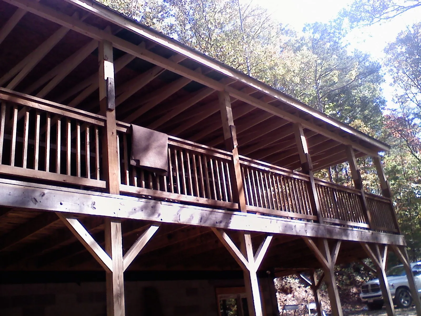 Timber framing under a new elevated porch and deck — Roof Leak Repair in Double Springs by Roofing Brothers